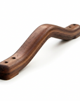 British handmade wooden grab rail by Luxworth, steam-bent oak, ash, and walnut for indoor use, showcasing craftsmanship and natural wood finish.
