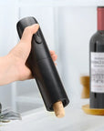 Luxworth electric corkscrew opening a wine bottle, showcasing its sleek design and automatic cork removal feature.