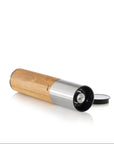 Electric one-handed mill with natural wood and steel, designed for indoor use by DK Household Brands for fresh ground spices.