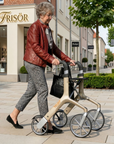 Let's Fly luxury rollator by Trust Care Luxworth with four wheels, adjustable height, and comfortable padded seat.