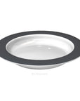 Small discreet sloped dining plate by Luxworth, designed as an eating aid, with a raised edge for easier food scooping.