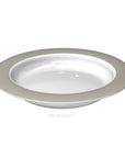 Small discreet sloped dining plate by Luxworth, designed as an eating aid, with a gentle slope for easier food scooping.