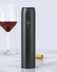 Luxworth electric corkscrew opening a wine bottle with a sleek design and ergonomic handle.