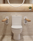 Foldable wooden and satin aluminum toilet grab rail by Luxworth, showing its sturdy design and easy-to-grip features for bathroom safety.