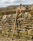 Luxworth natural chestnut crook handle walking stick with polished wood finish and ergonomic design.
