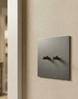 Grey stainless steel Luxworth indoor easy-toggle light switch with a sleek, modern design and secure toggle mechanism.