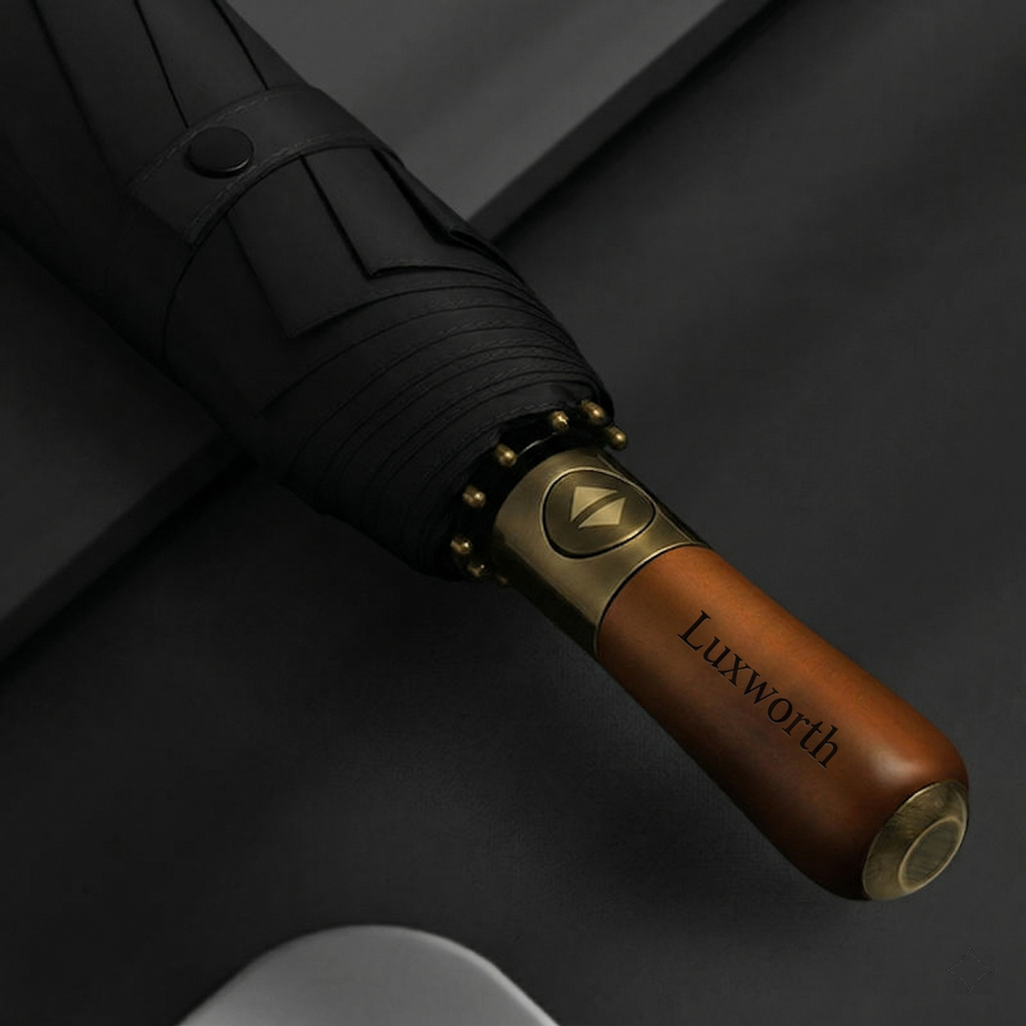 Luxworth compact travel umbrella open, showing its lightweight design and sturdy frame, ideal for portable rain protection.