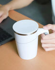Luxworth spill-proof thermal mug with lid, stainless steel exterior, and ergonomic design for hot and cold beverages.