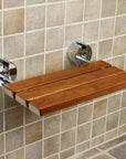 Luxworth teak folding shower seat with sturdy metal frame, foldable design, and smooth teak wood surface for comfortable bathing.