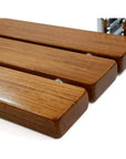Luxworth teak folding shower seat with adjustable legs, lightweight design, and teak wood surface for comfortable bathroom use.