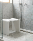 Luxworth minimalist stone shower seat with solid surface design, ideal for bathroom use and modern shower spaces.