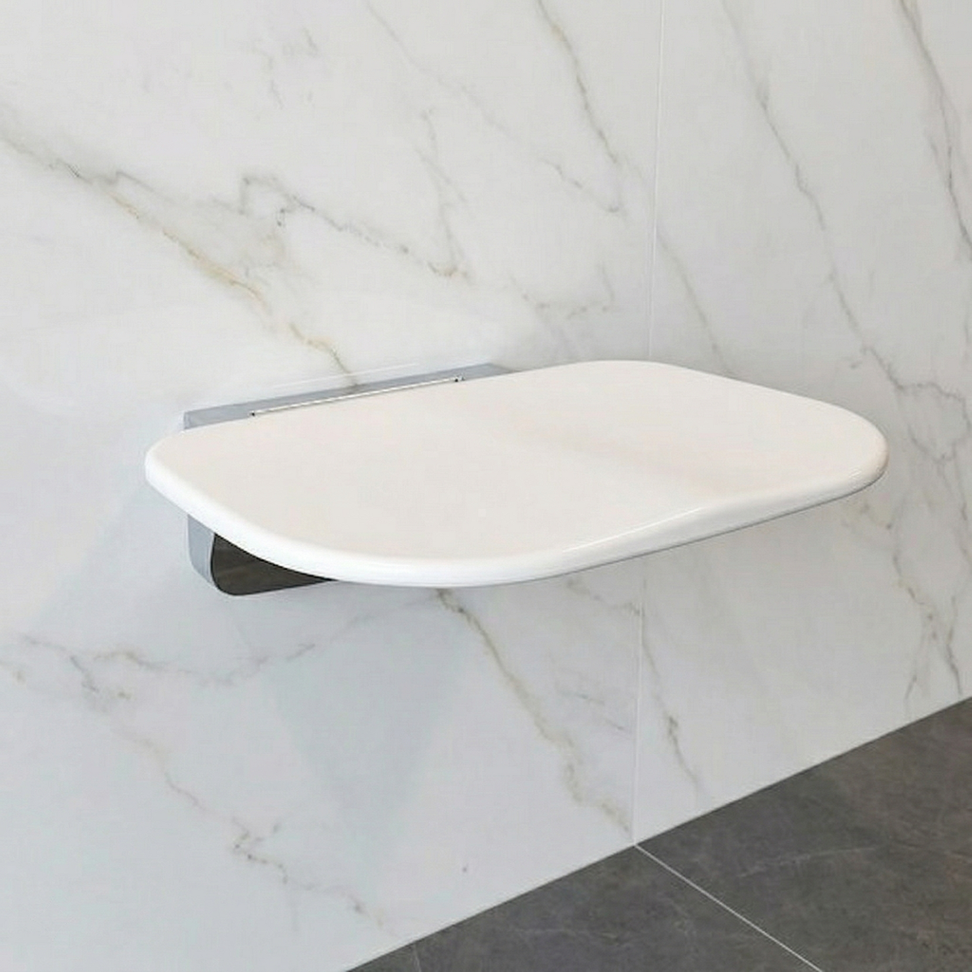 Modern folding shower seat by Luxworth, wall-mounted shower seat with a sleek design for comfortable bathing.