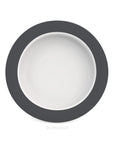 Small discreet sloped dining plate by Luxworth, designed as an eating aid, with a gentle sloped edge for easier food scooping.